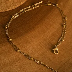 Tobillera dorada doble