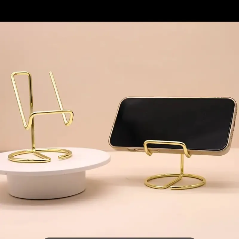 Soporte de teléfono dorado