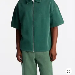 Polo Overzice con zipper frontal