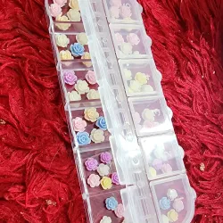 Caja de rosas de colores