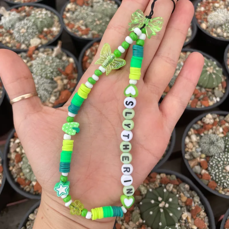 Strap de fimos y cuentas.