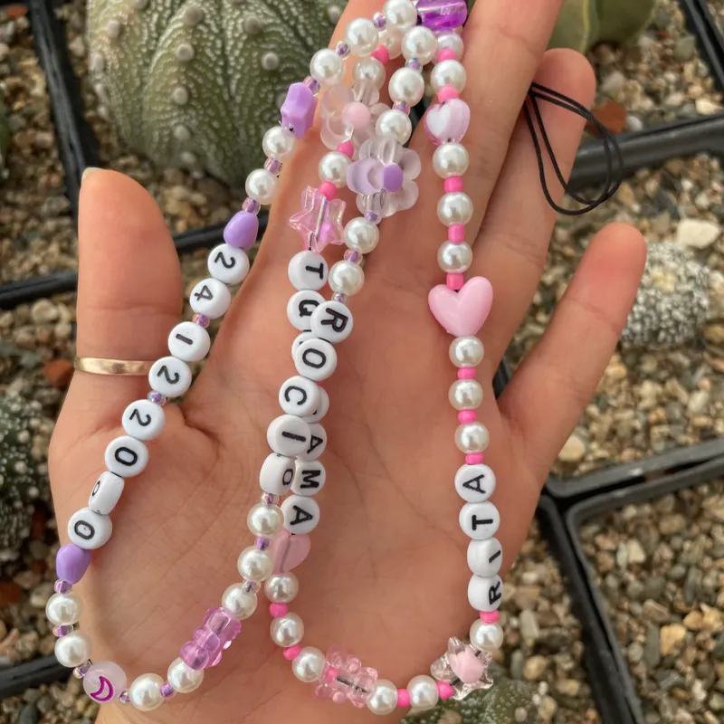 Strap perlas blancas 
