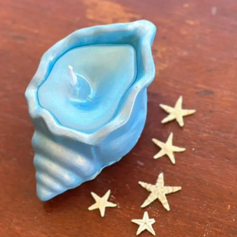 Velas artesanales aromáticas con forma de caracola 
