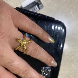 Anillos ajustables dorado estrella relieve