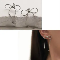 Aretes lazos (dorados y plateados)