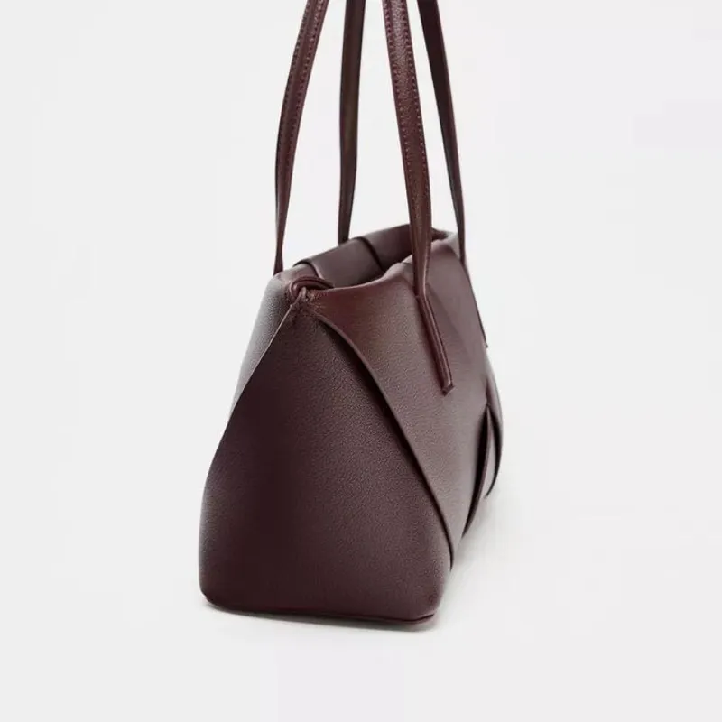 Bolso alargado entrelazado