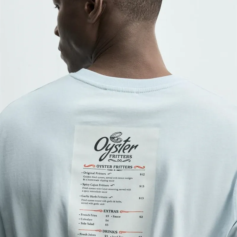 CAMISETA ESTAMPADO CONTRASTE PARCHE