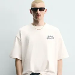 CAMISETA RELAXED FIT TEXTOS ESTAMPADOS