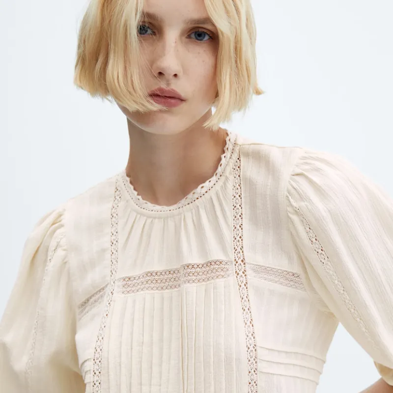 Vestido bordado manga abullonada