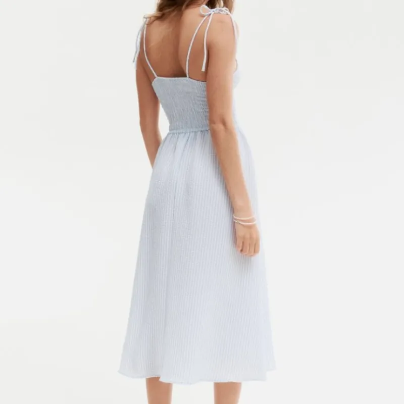 Vestido en punto smock tirantes de lazo 