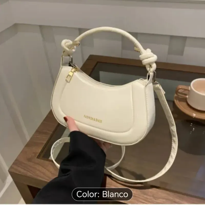 Cartera con asa en forma de nudo 