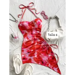 Vestido atado al cuello con detalle de lazo en la cadera 