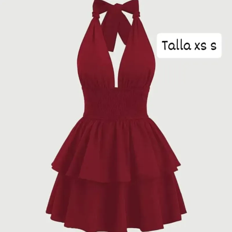 Vestido atado al cuello con falda de vuelos 