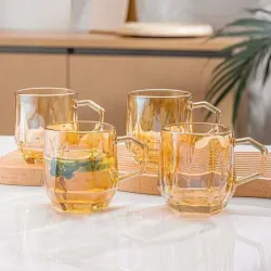 Set de 2 tazas de vidrio doradas