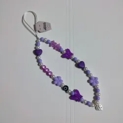 Colgante de telefono morado con ojo turco