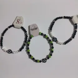 Pulcera de ojo turco y shawrosky de cristal negro