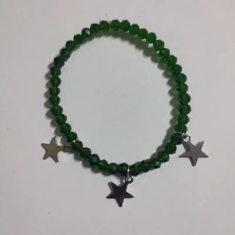 Pulceras de shawrosky y dijes de estrellas