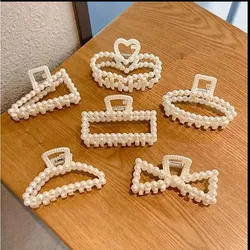 Ganchos de perlas para el cabello.