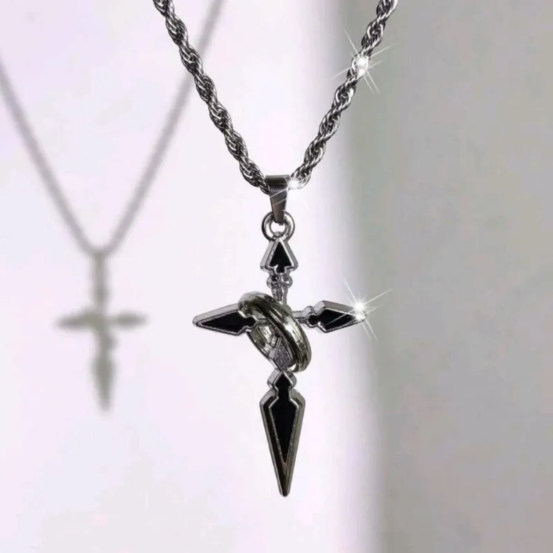 Collar de cruz de pico con gema negra