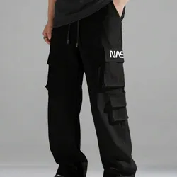 Manfinity EZcore Pantalones casuales con bolsillos cargo, cintura con cordón y estampado de letras para hombres, pantalones negros de estilo urbano, otoño
