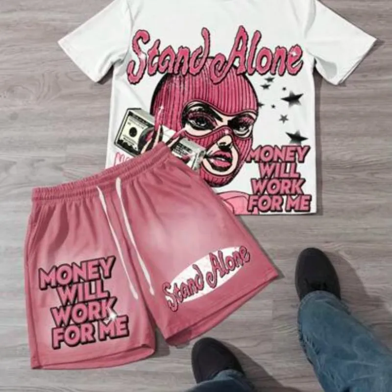 Manfinity Streetrush Conjunto de 2 piezas para hombre: Camiseta casual de manga corta cuello redondo con estampado de lema y personaje, y pantalones cortos con cordón en la cintura