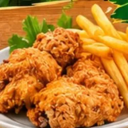 Pollo frito con papas fritas