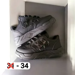 Zapatillas negras con siper