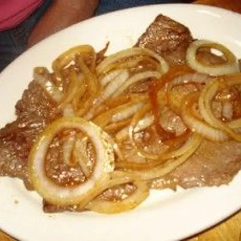 Cerdo Real Encebollado