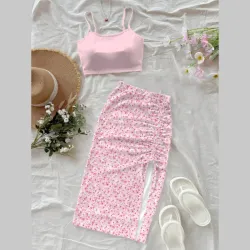 Conjunto de top y saya rosa