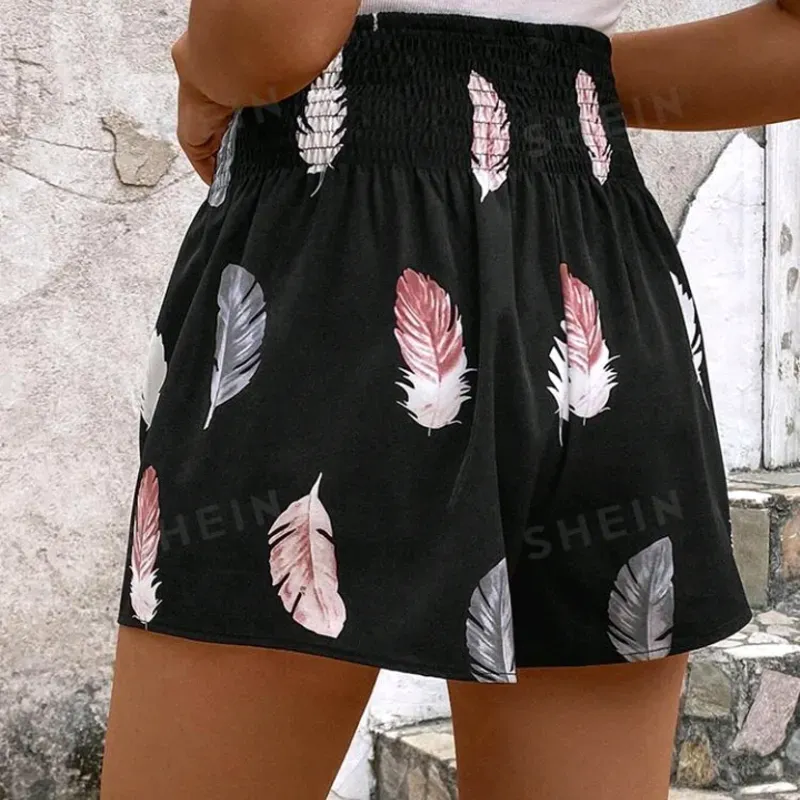 0021 Shorts con estampado de pluma de cintura elástica