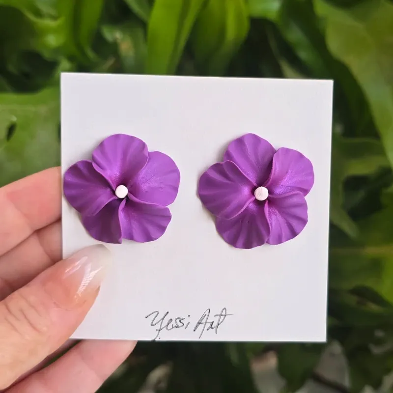 Pendientes morados